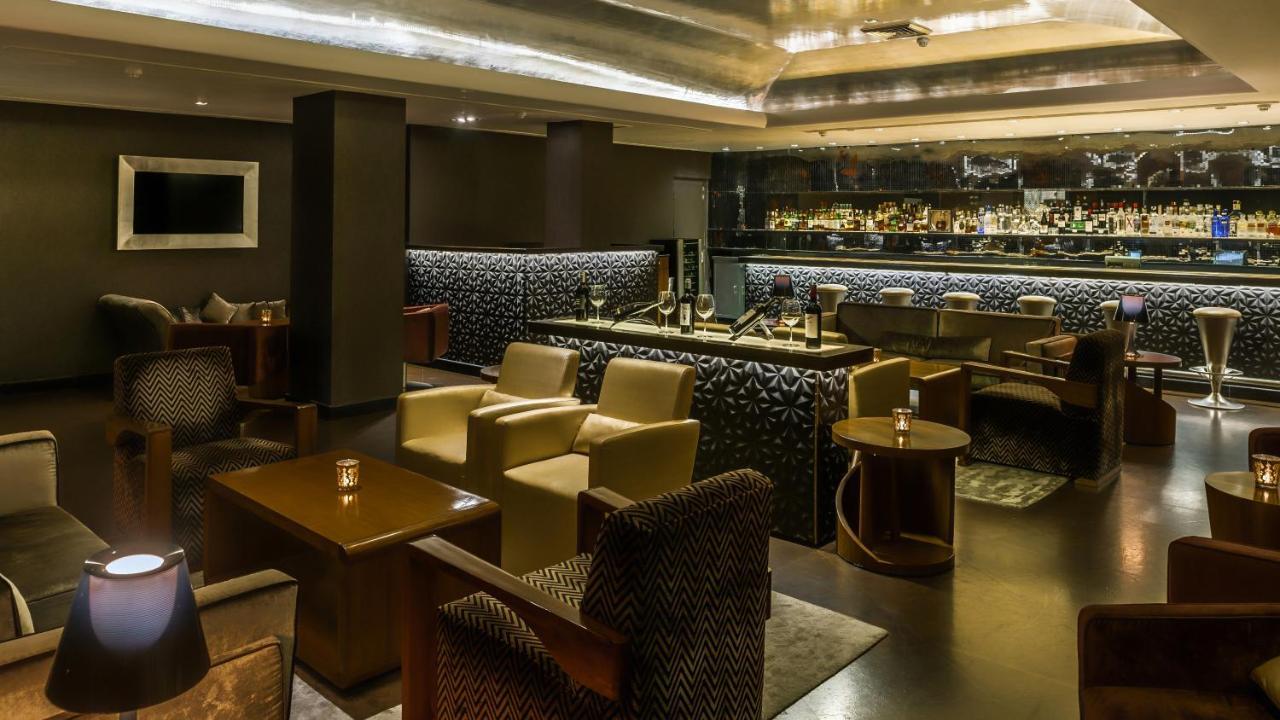 더 클라리지스 뉴 델리 뉴델리 외부 사진 The bar at the Concourse Lounge