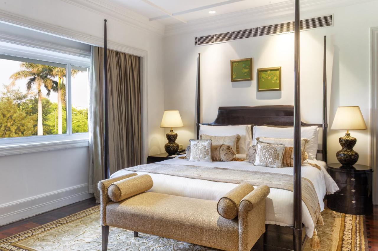 더 클라리지스 뉴 델리 뉴델리 외부 사진 A bedroom at the Taj Mahal Palace