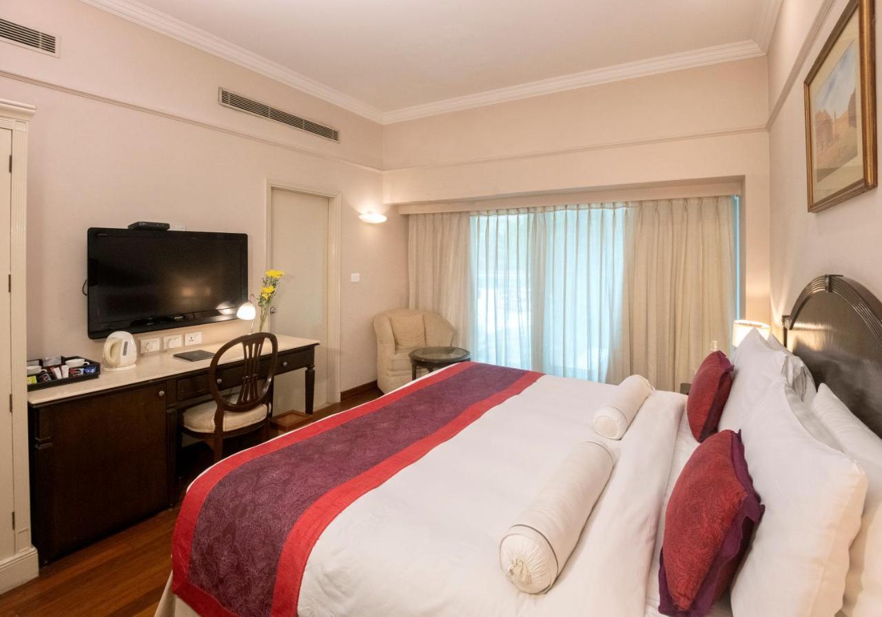 더 클라리지스 뉴 델리 뉴델리 외부 사진 A room at the Taj Bengal