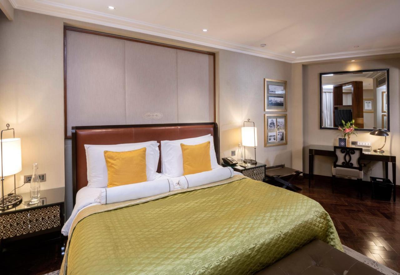 더 클라리지스 뉴 델리 뉴델리 외부 사진 A room at the Taj Mahal Palace